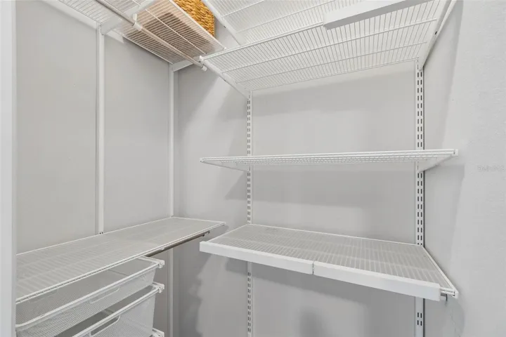 Guest room 3 walk-in closet with closet system