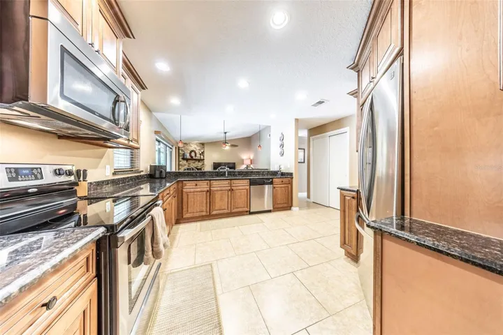 Kitchen with upgraded cabinets and granite counters