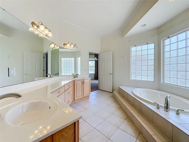 View of the Primary Bathroom Facing the Bedroom