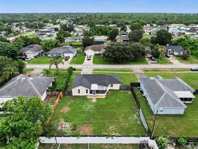With a large fenced yard and screened patio, this home is built for enjoying the Florida lifestyle.