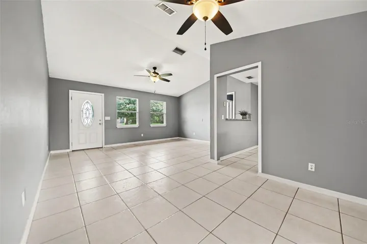Vaulted ceilings create an open, airy feel in the heart of the home.