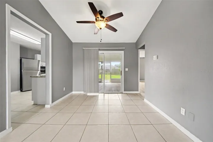 The dining area connects easily to the kitchen and living space for comfortable everyday living.