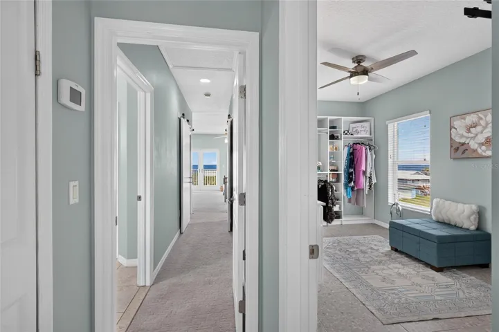 ENTRY TO PRIMARY BEDROOM - GUEST ROOM #1 ON RIGHT MAY ALSO BE USED AS A PRIMARY DRESSING ROOM