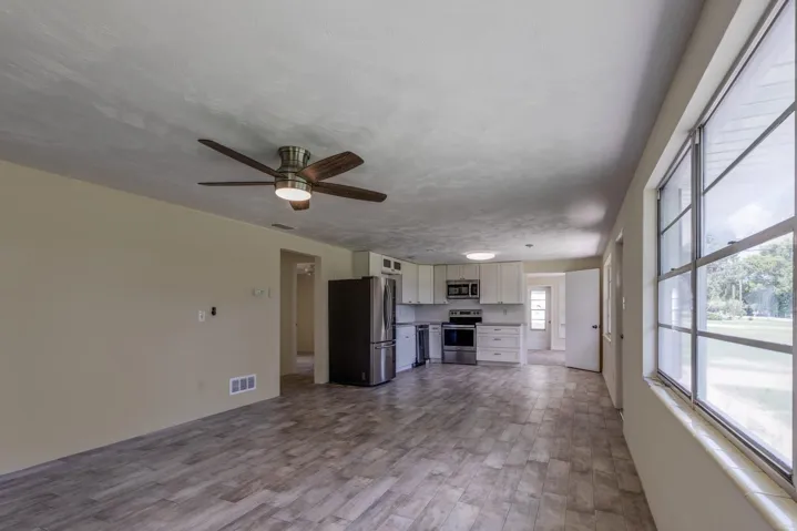 Open concept living to kitchen