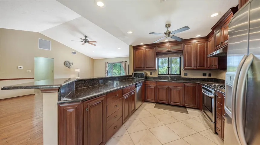 Custom Made Kitchen Cabinetry, Stainless Steel Appliances