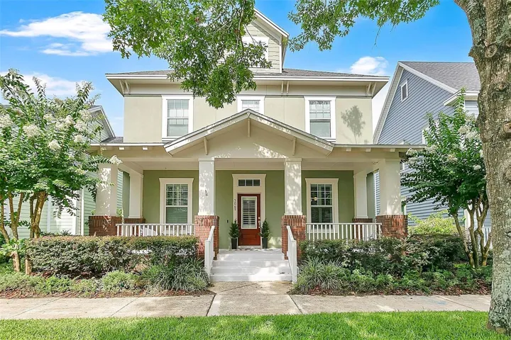 Timeless craftsman architecture with full front porch living