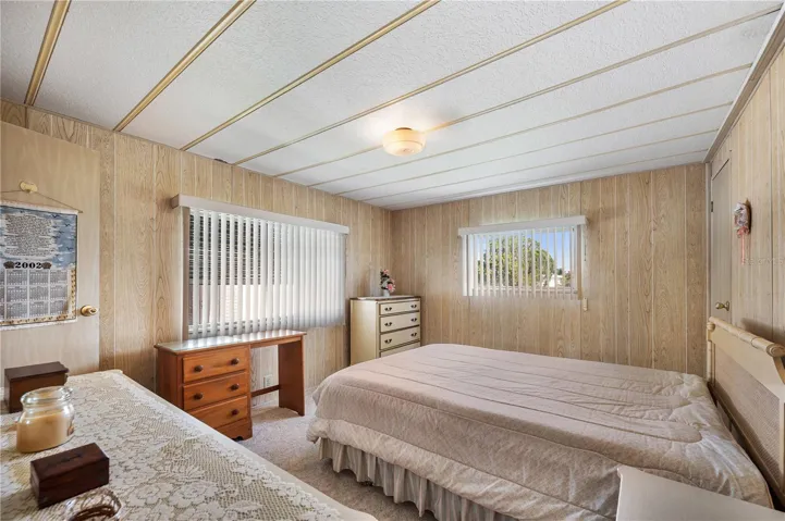 Primary bedroom with walk-in closet