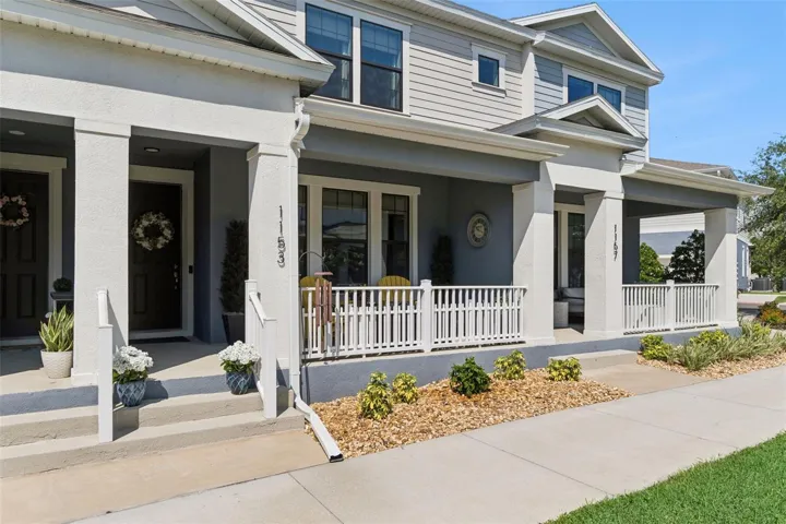 Gorgeous front facade with a porch big enough to enjoy