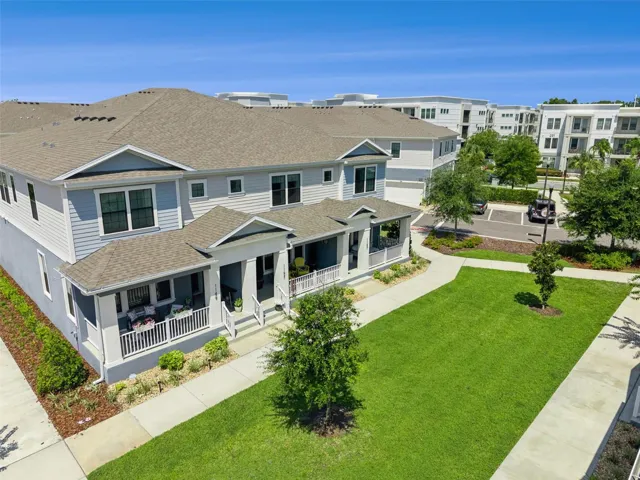 Gorgeous photo of your front green space right off of your private porch.
