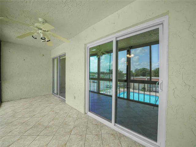 large patio with access from living room and primary bedroom