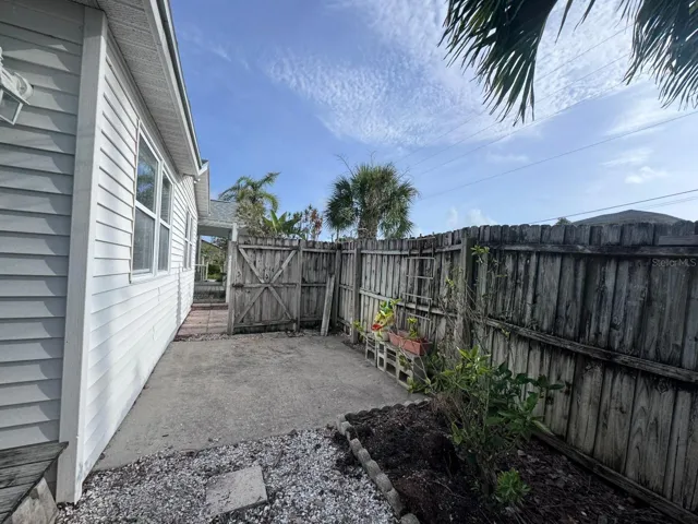 Front Side Yard (West Side)