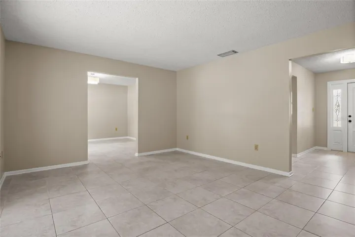 living room looking into the dining room and foyer