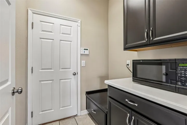 Downstairs Mudroom with custom cabinets