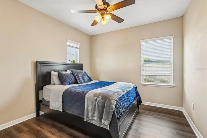 Bedroom 2 with laminate new laminate flooring,  large closet and access to jack and jill bathroom