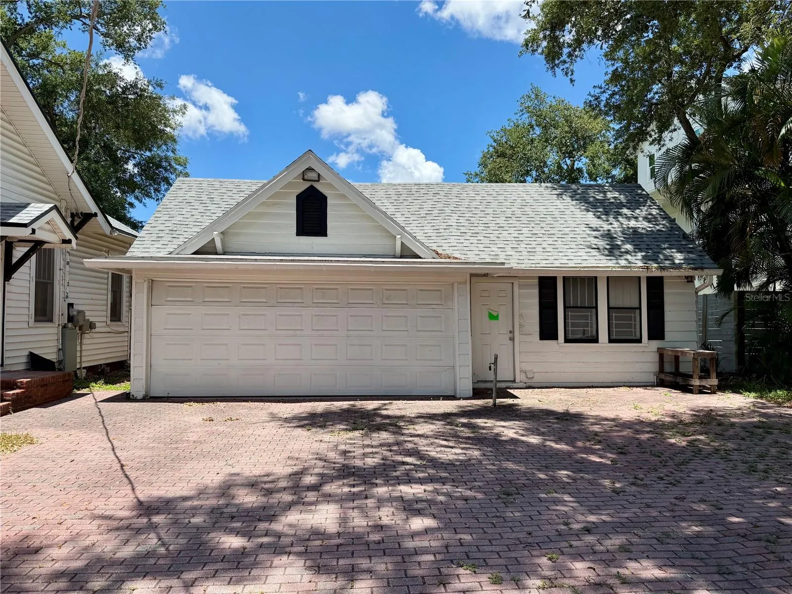Two car garage, storage room, laundry room and plumbing for half bath.