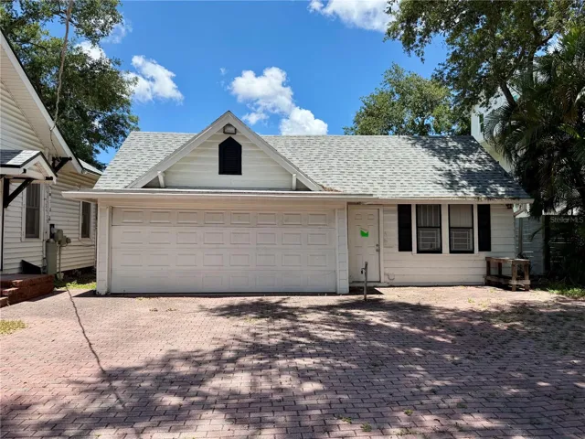 Two car garage, storage room, laundry room and plumbing for half bath.