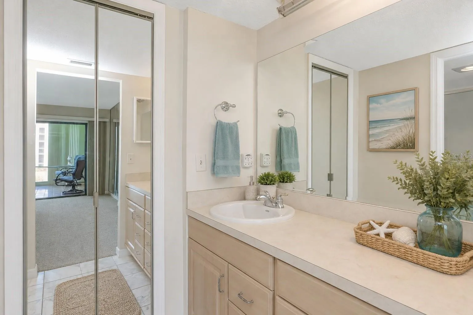 Primary ensuite full bathroom with walk-in closet - virtually staged