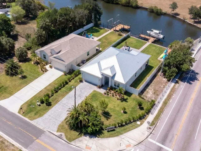 Renderings/images with homes are conceptual only and are intended to show possible use of the vacant land; no home or structure currently exists on the property.