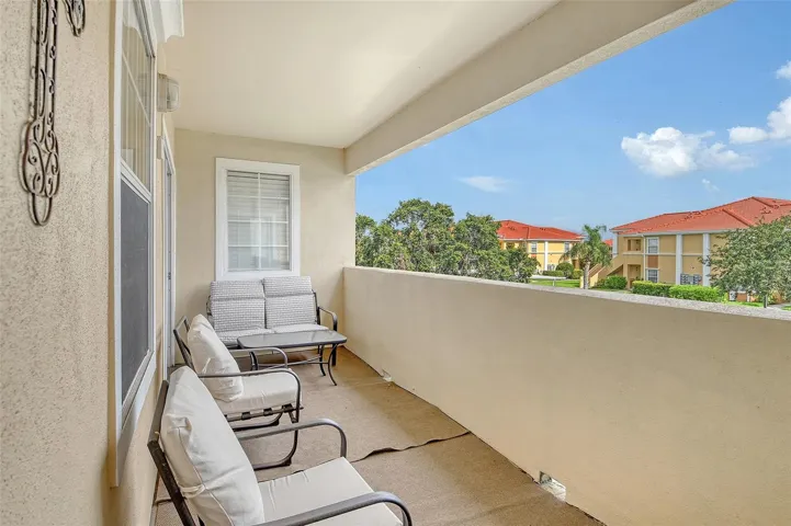 Porch accessible from dinette and primary bedroom
