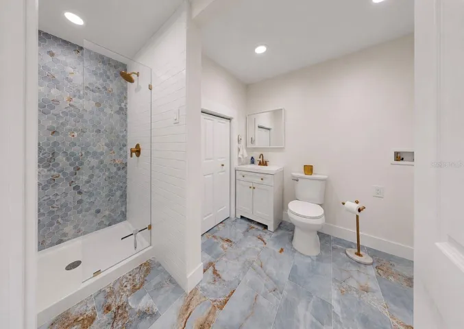Full Bath 2 with Laundry Closet and Exterior Door for Convenience