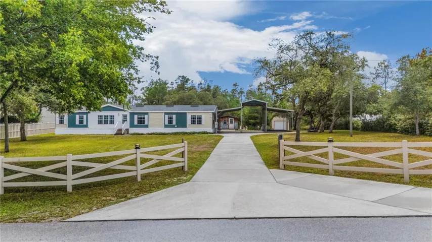 Front elevation of 6311 Nodoc Rd from street