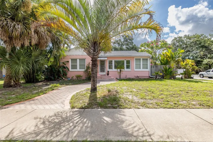 Front of Home featuring Pavered Walkway