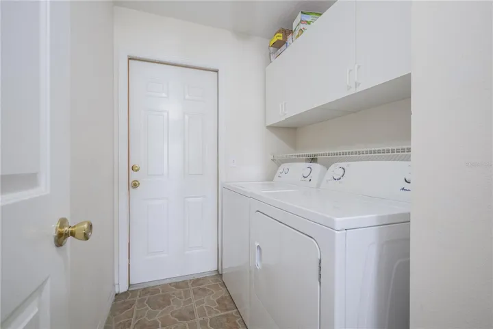 Inside washer & dryer direct to the 3 car garage