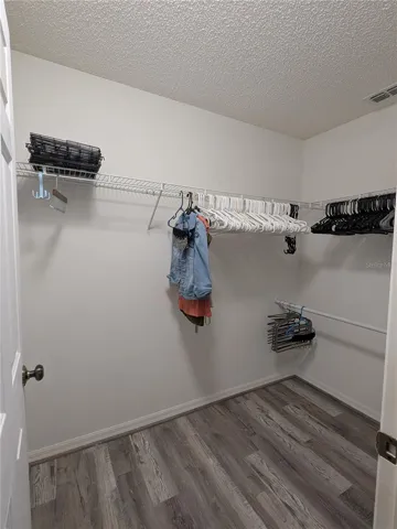 PRIMARY WALK IN CLOSET