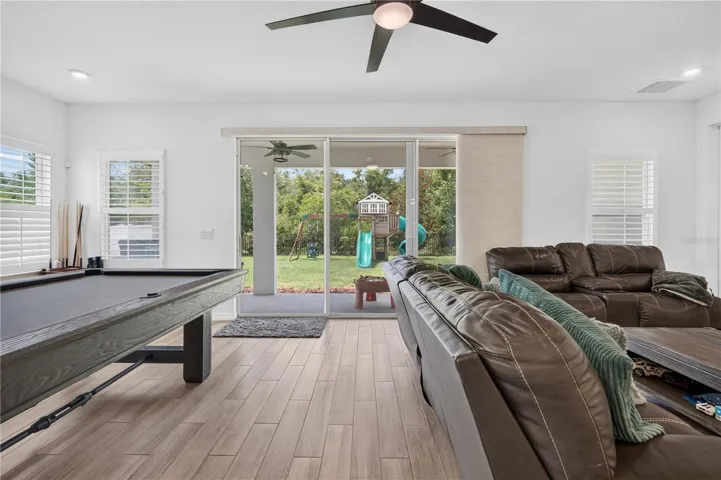 Living Area with the view of the backyard