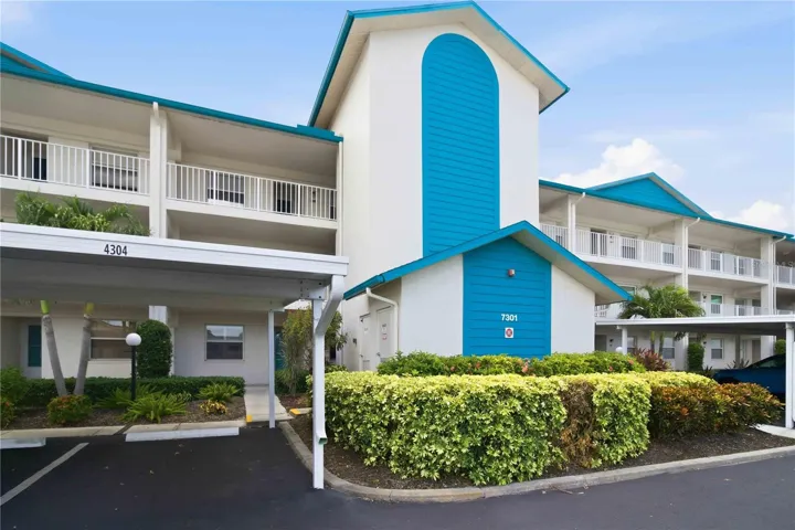 Convenient location on first floor straight ahead! Carport spot to the left under cover too!