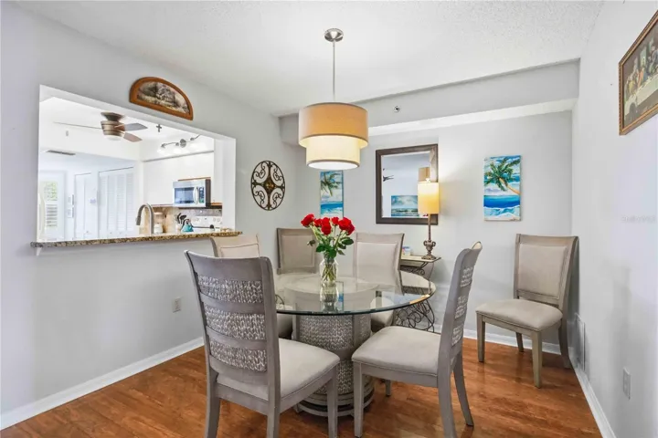 Modern dining room for entertaining guests to the right