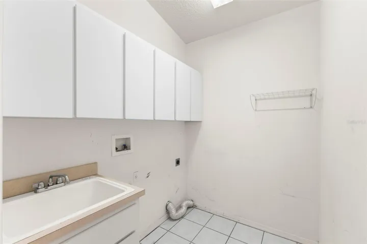 Laundry room located off kitchen
