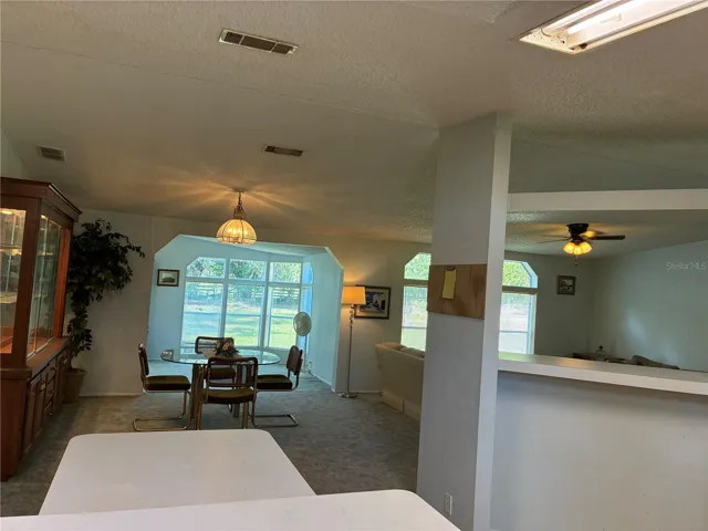 looking out of kitchen to sunroom