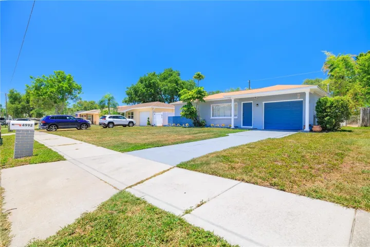 Generously sized driveway + 1 Car Garage