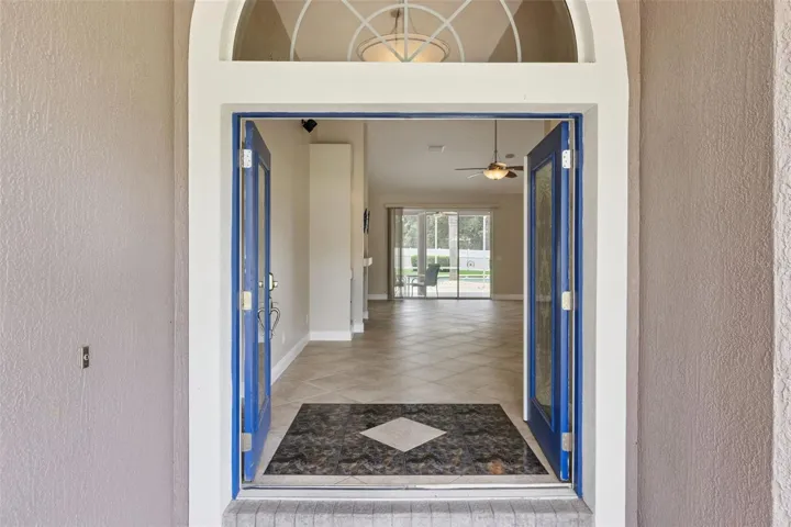 Foyer with decorative tile at entry