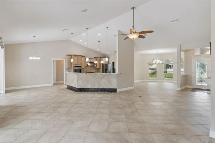Living room looking into kitchen, dining room &amp; everyday eating area