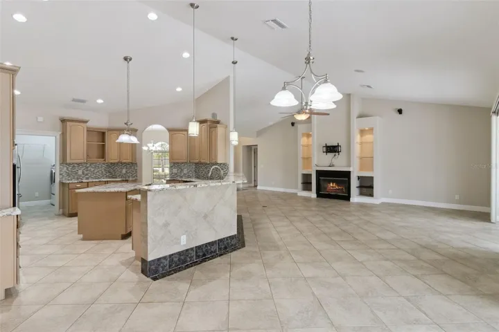 View of living room &amp; kitchen from everyday dining space