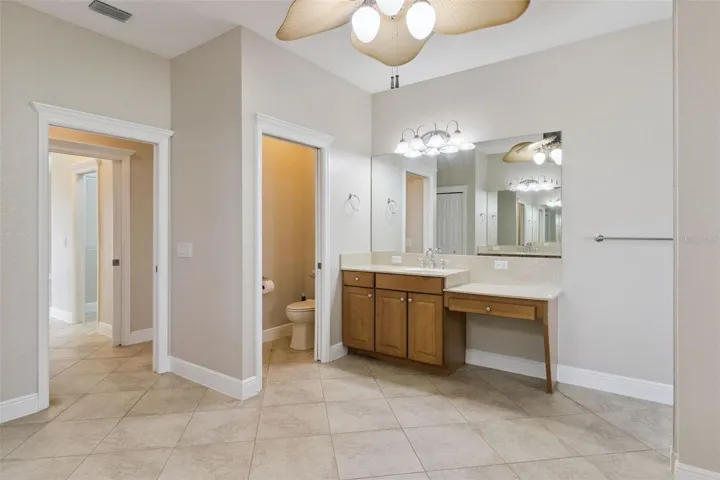 Primary bath with dual vanities and drop down makeup counter