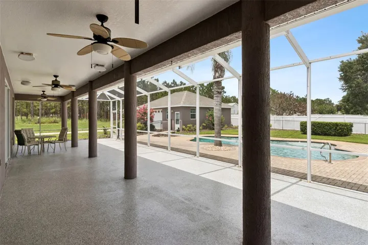 Screened porch with 10 x 50 ft under roof and 8 x 50 ft open-air screen section. Built-in speakers &amp; hookup for TV
