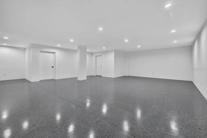 3 car tandem garage with epoxy floors