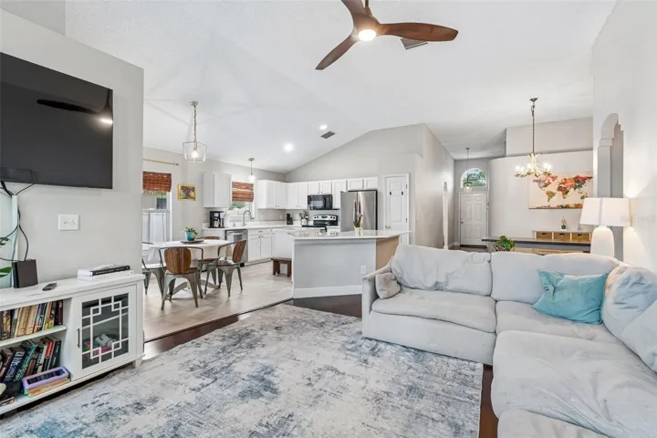 The home has a flowy living, dining, and kitchen space.