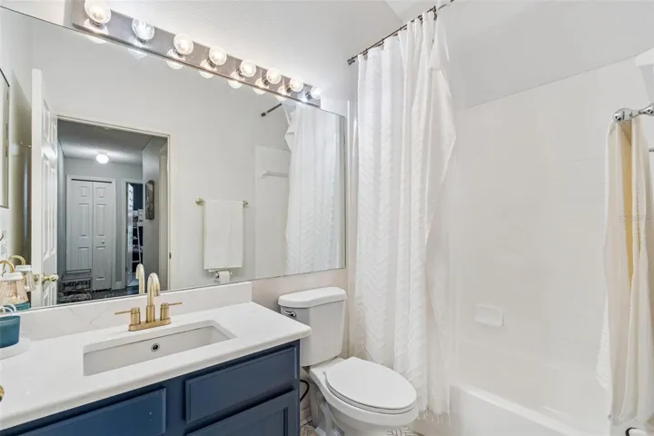 Bath 2 with quartz and herringbone tilework