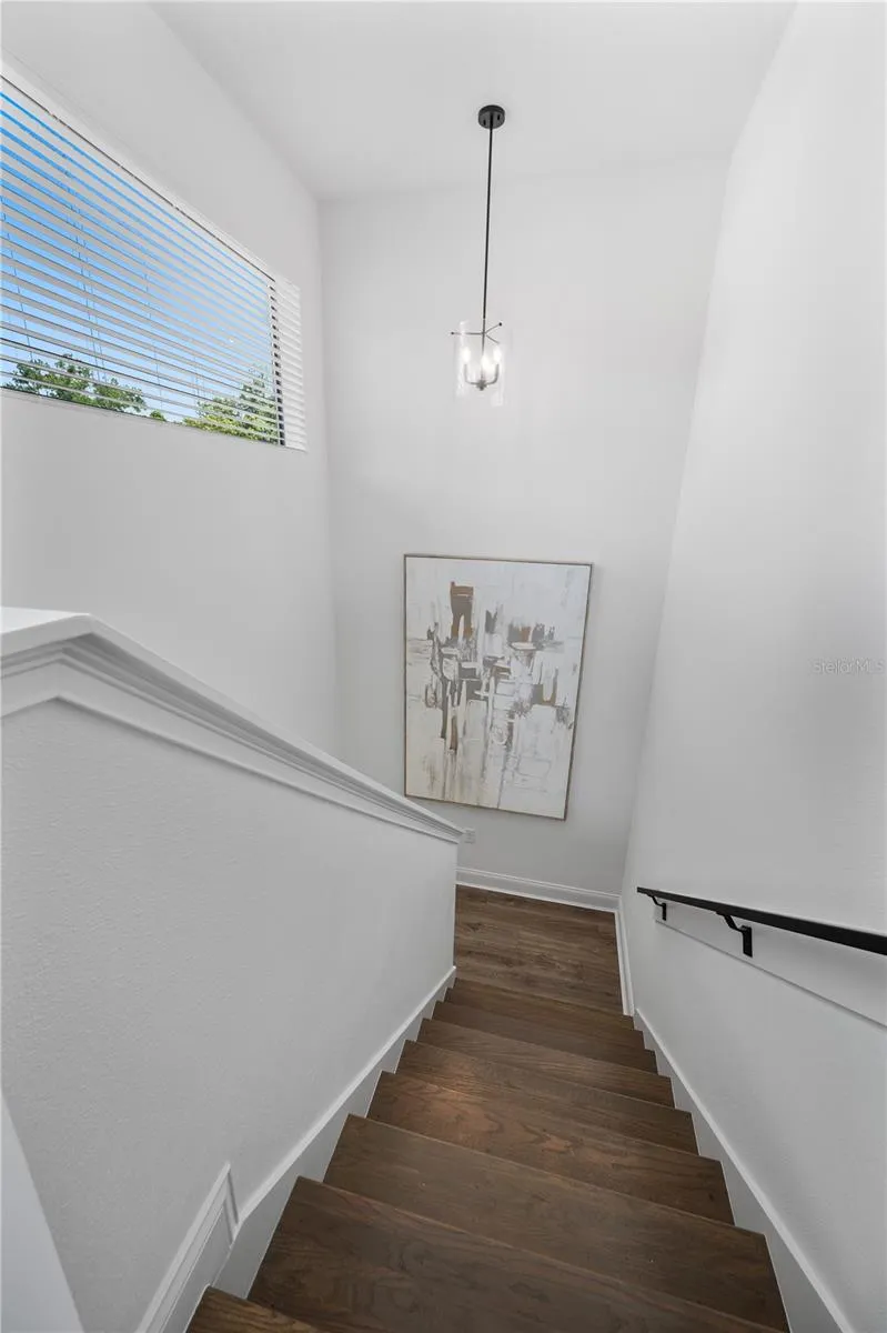 Stairs to upstairs loft and bedrooms