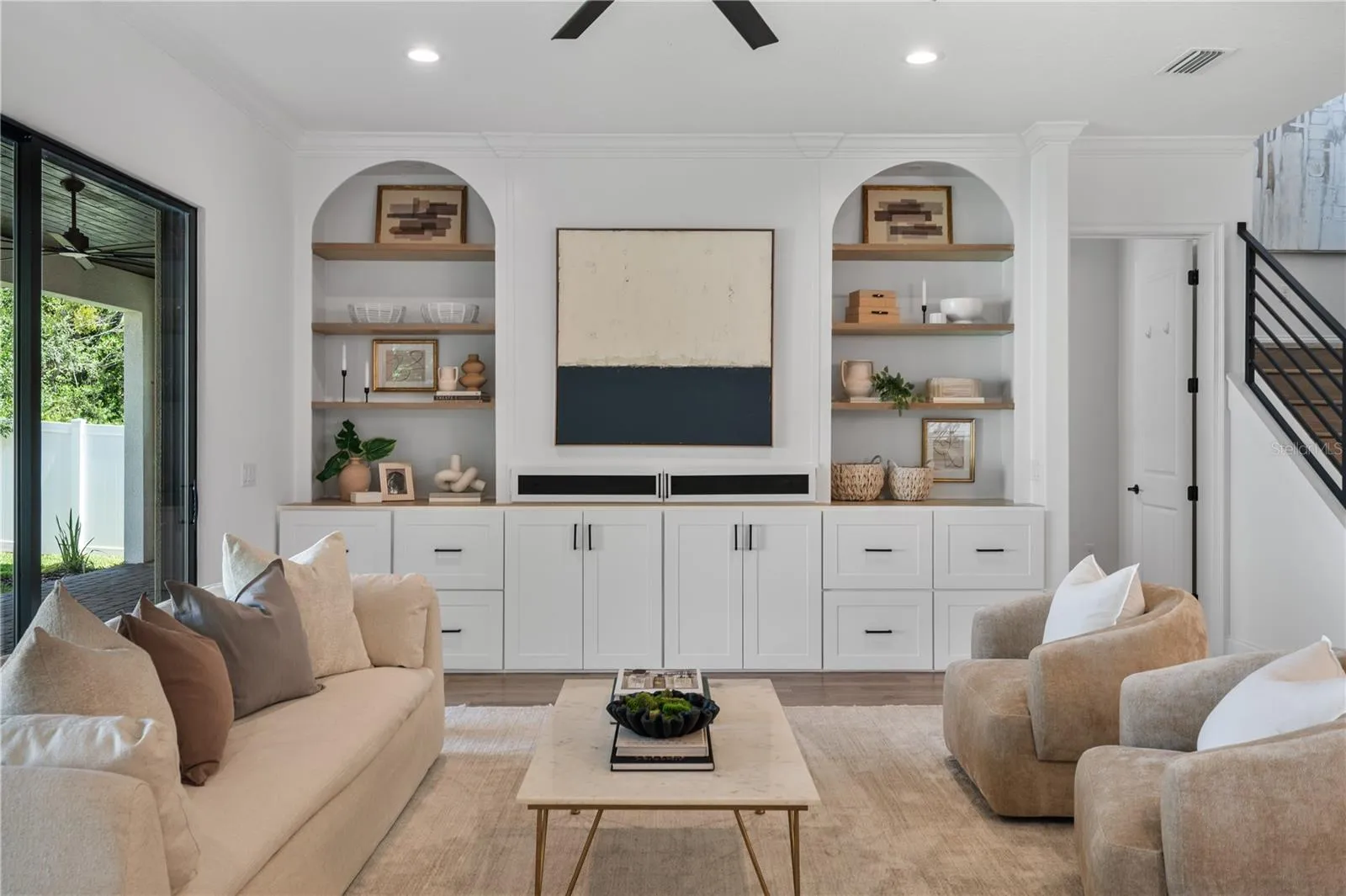 Built-in entertainment system with arch accents