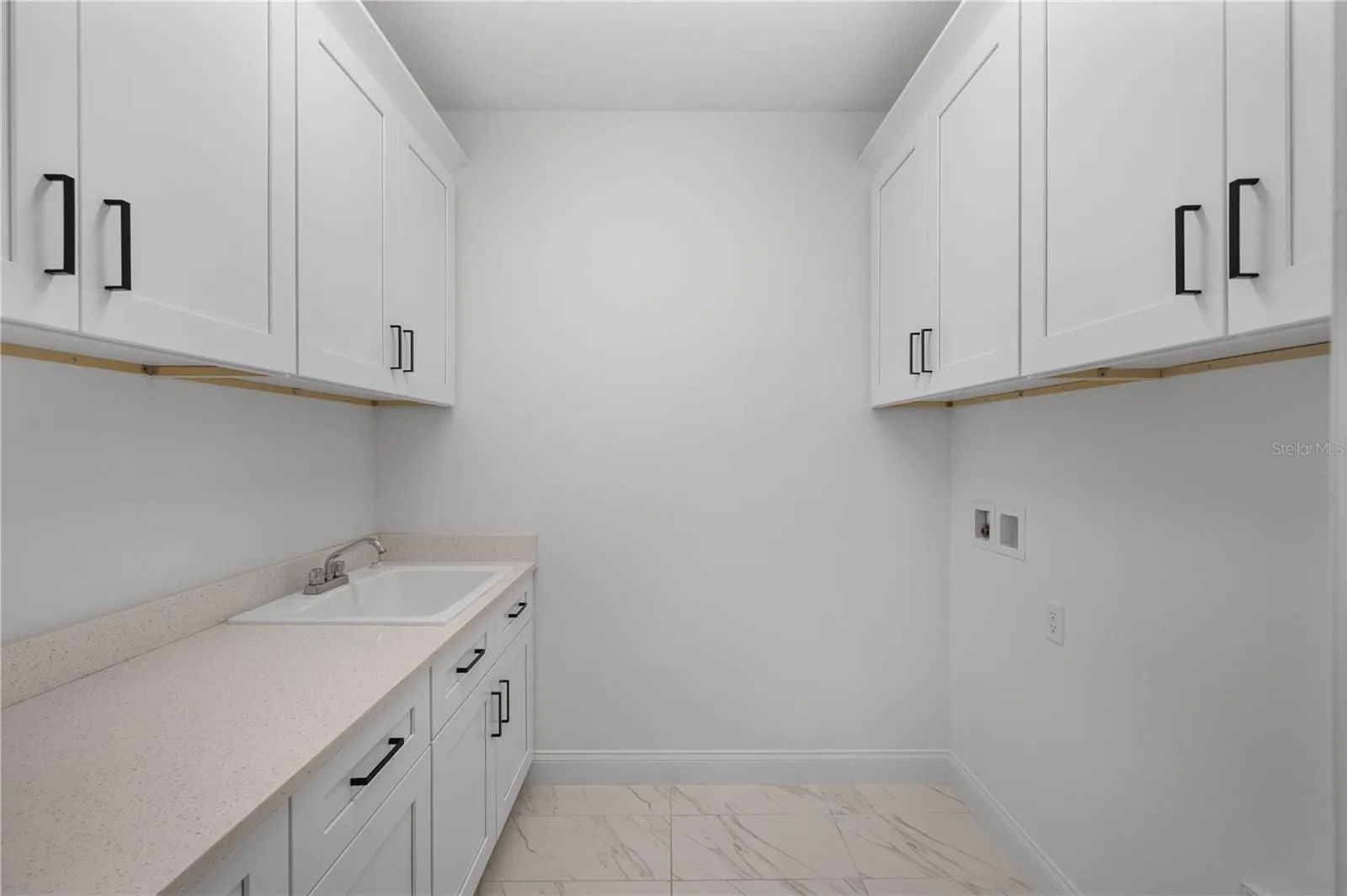 Laundry room off garage entry