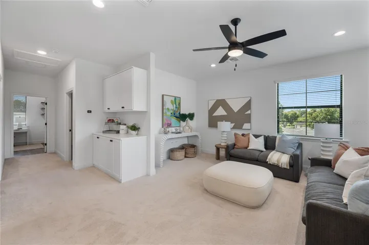 Upstairs loft that is pre-plumbed for a wet bar or can be drywalled in for an additional upstairs bedroom