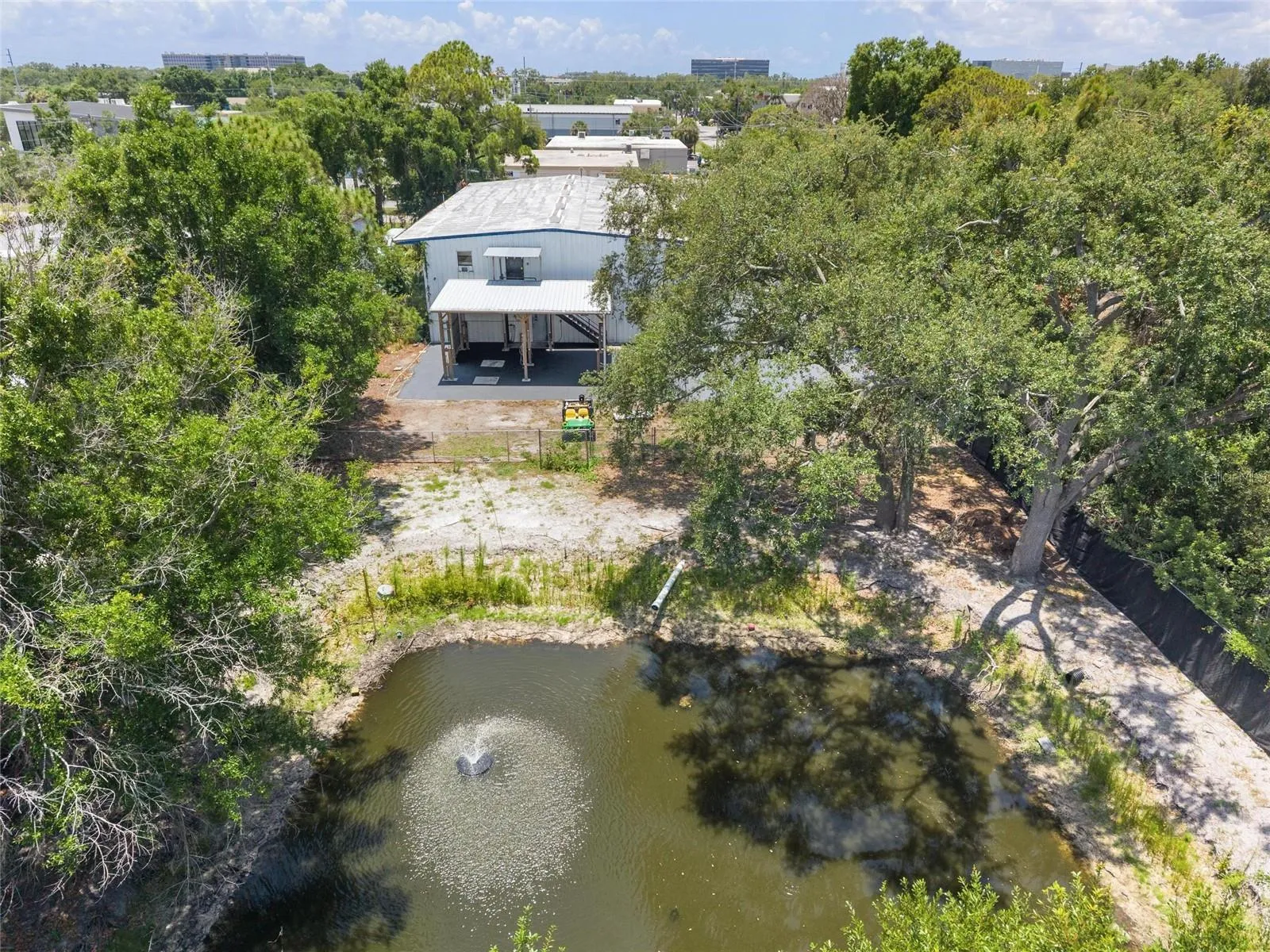Aerial of Pond Behind Building