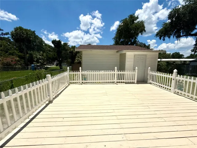 Deck off Kitchen & 3rd Bedroom & Laundry Area
