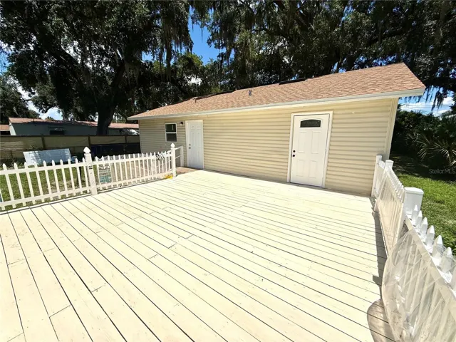 Deck off Kitchen & 3rd Bedroom (Back of Home)