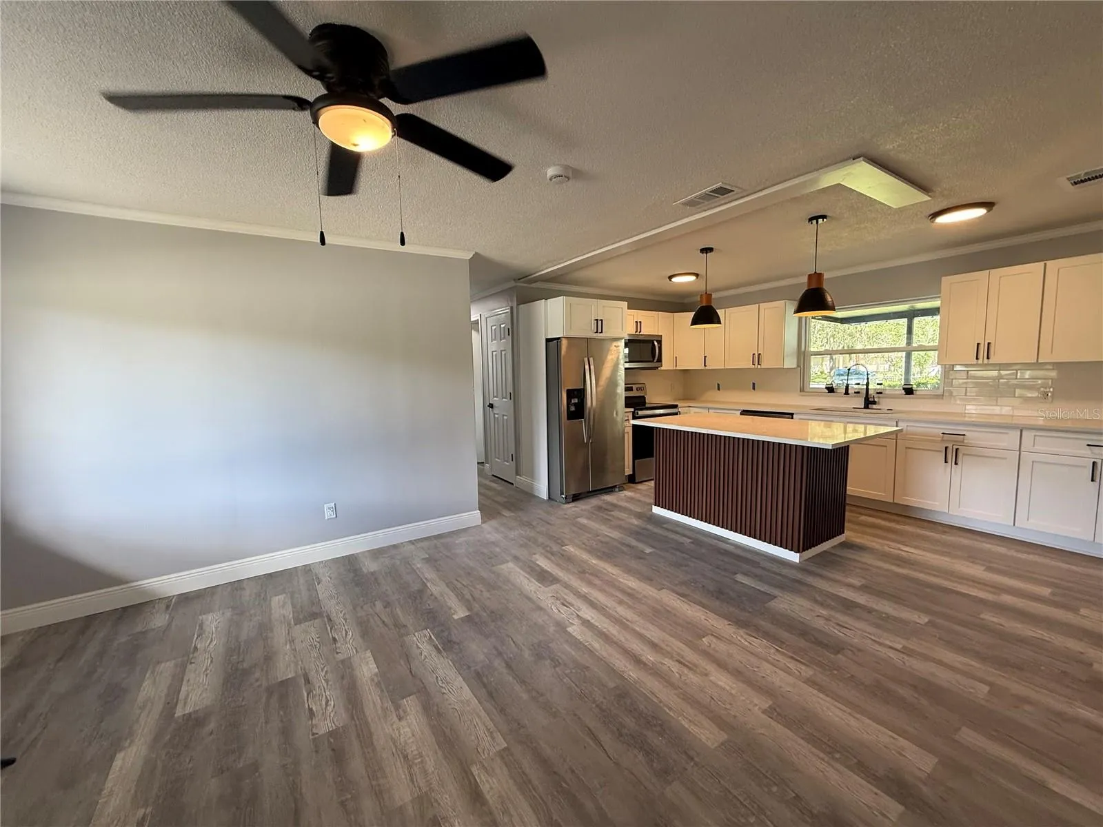 living room and connected kitchen